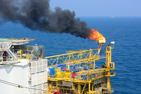 Oil rig with gas flame