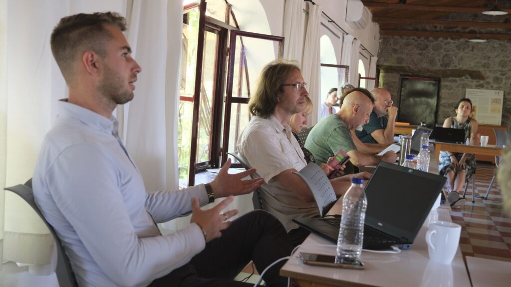 Discussions at the workshop. From left; Kelvin Wade Ivankovic, Jeroen Pieter van der Sluijs, Oksana Singh and Silvio Funtowicz.  