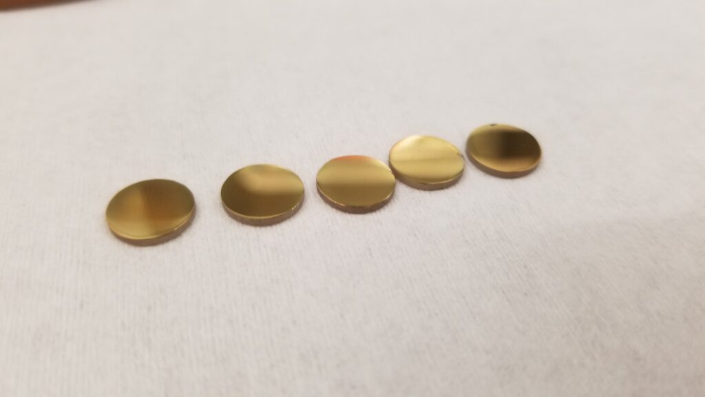 Five golden disks in a row.