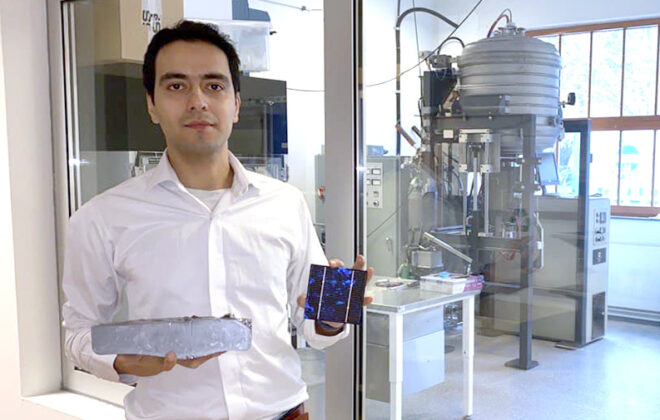 Researcher with solar cell materials. Photo